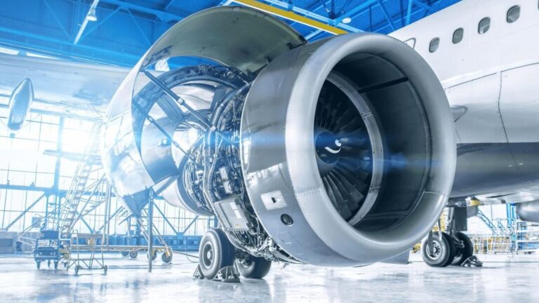 Jet engine in an aerospace hangar – automotive manufacturers moving into aerospace and defence need energy security